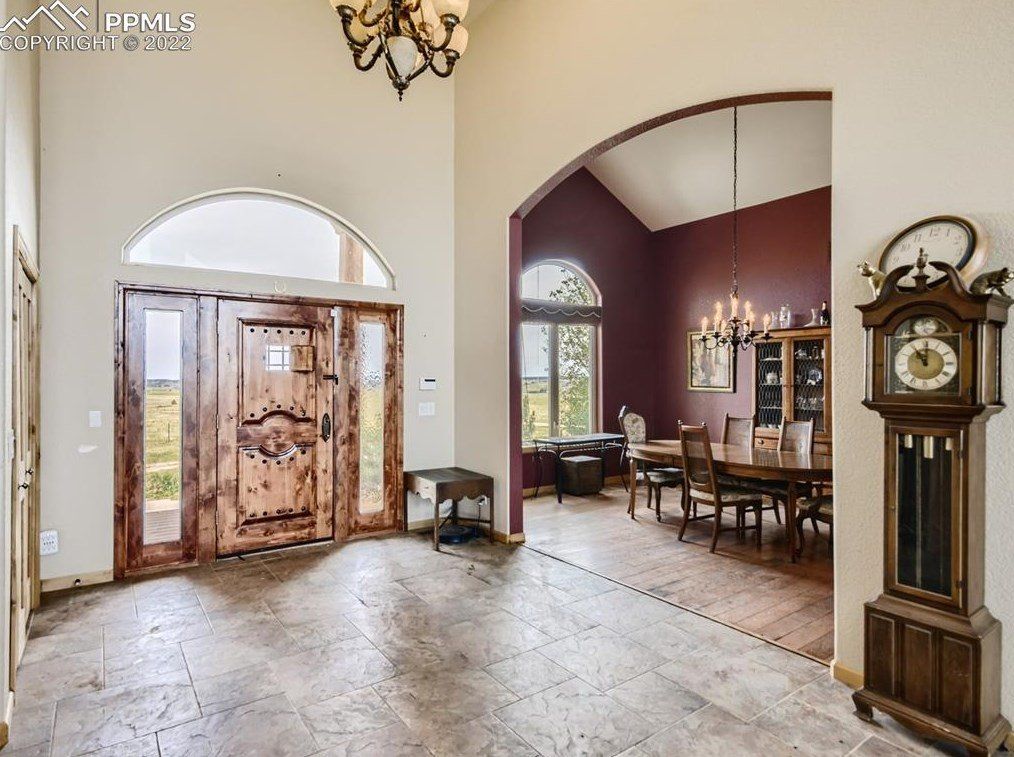 A large room with a clock in the middle of it