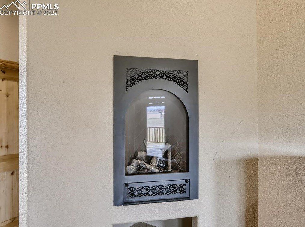 A fireplace is built into the wall of a house