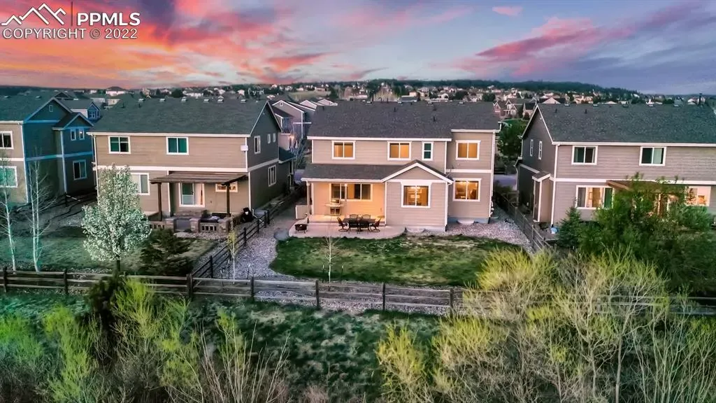 An aerial view of a row of houses in a residential area.