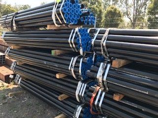 Bundle of pipes with blue circle