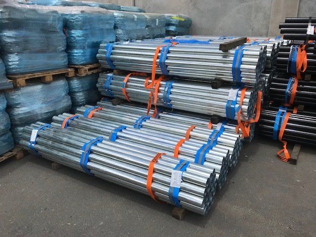 Pipes tied with blue and orange threads