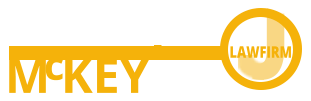 Yellow Mickey Law Firm logo with stylized text and circular emblem