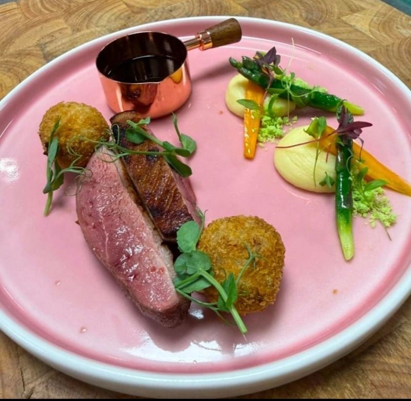 Chef David Henderson roast duck breast with croquettes and spring vegetables