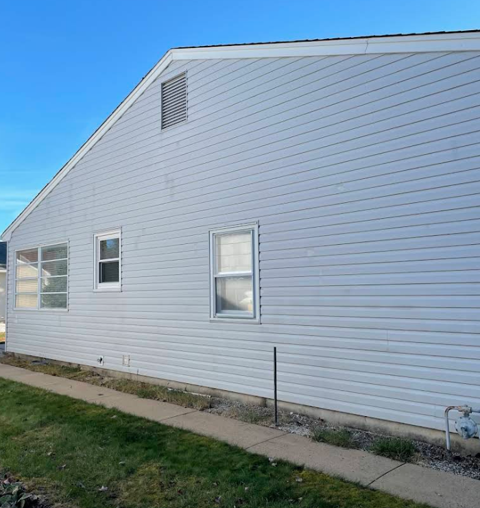 A complete soft washing job for a house siding in toms river nj.