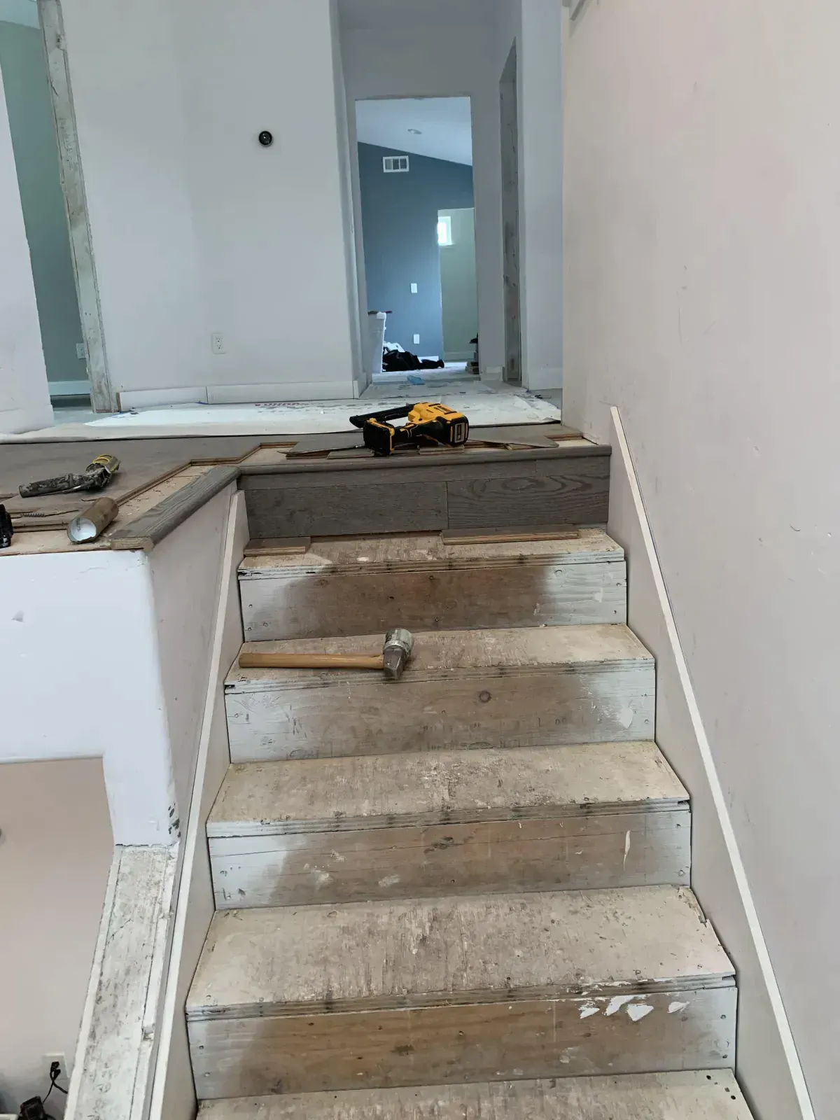 A set of stairs that are being built in a house.
