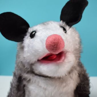 Cute handmade opossum hand rod puppet