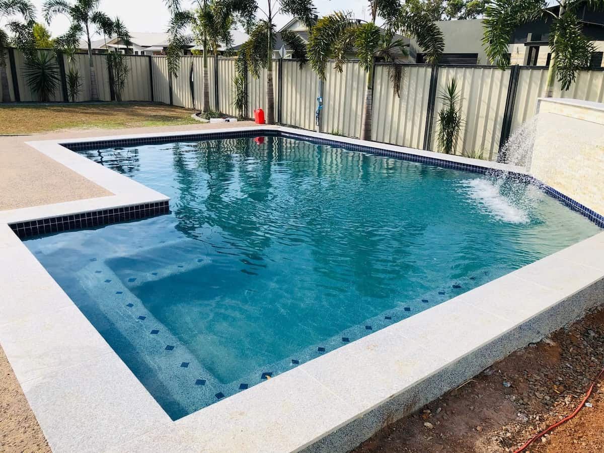 Rectangular Pool With Turquoise Water, Steps, and a Small Waterfall — Rod Hardy Plunge Pools in Girraween, NT
