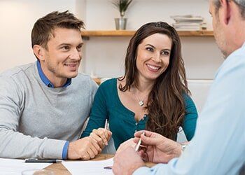 Couple Clients Dealing With The Agent At The Office — Mobile Mortgage Broker in Slade Point QLD