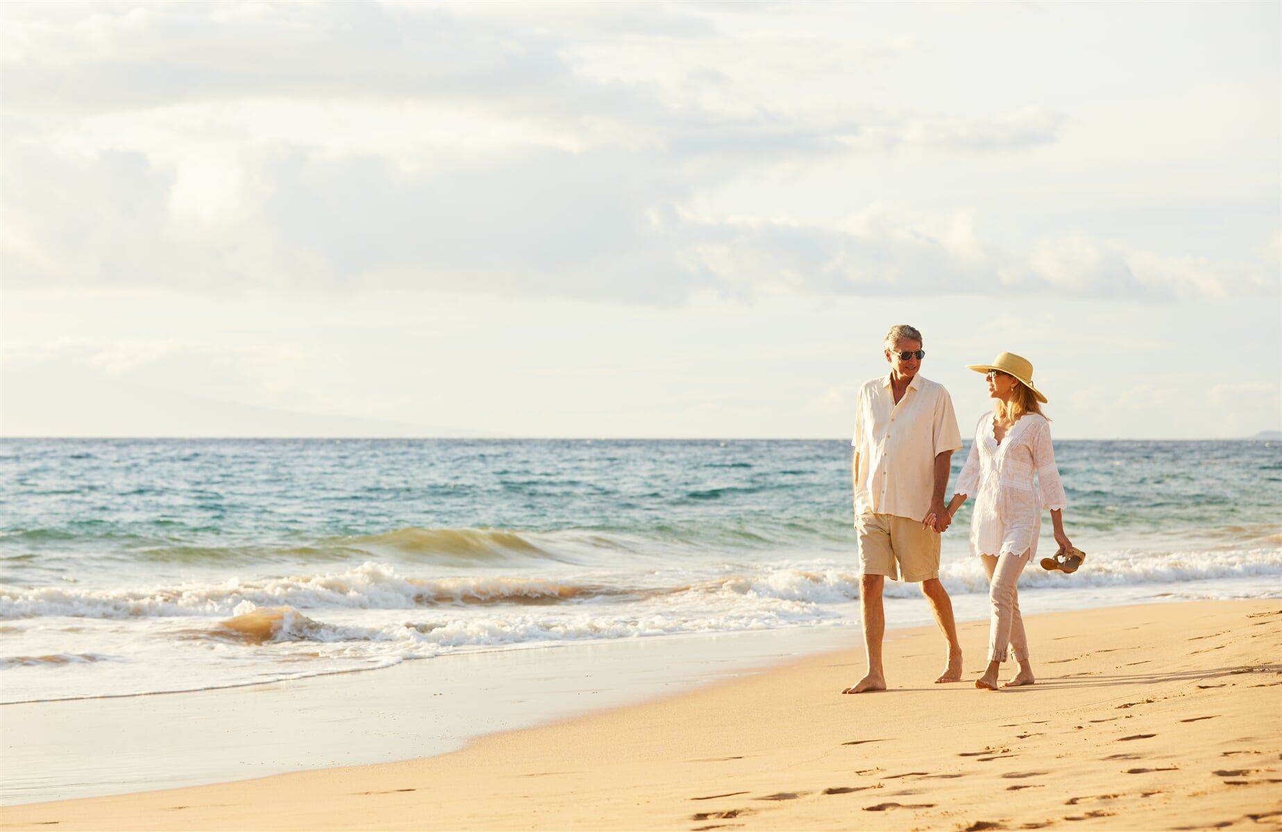 Couple At The Beach — Home Loan Types in Slade Point QLD