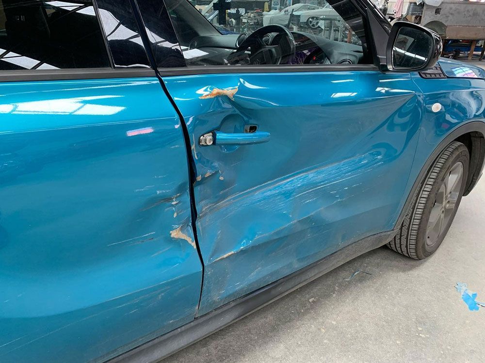Damaged Car Door for Repair — John Zelukovic Smash Repairs in Lithgow, NSW