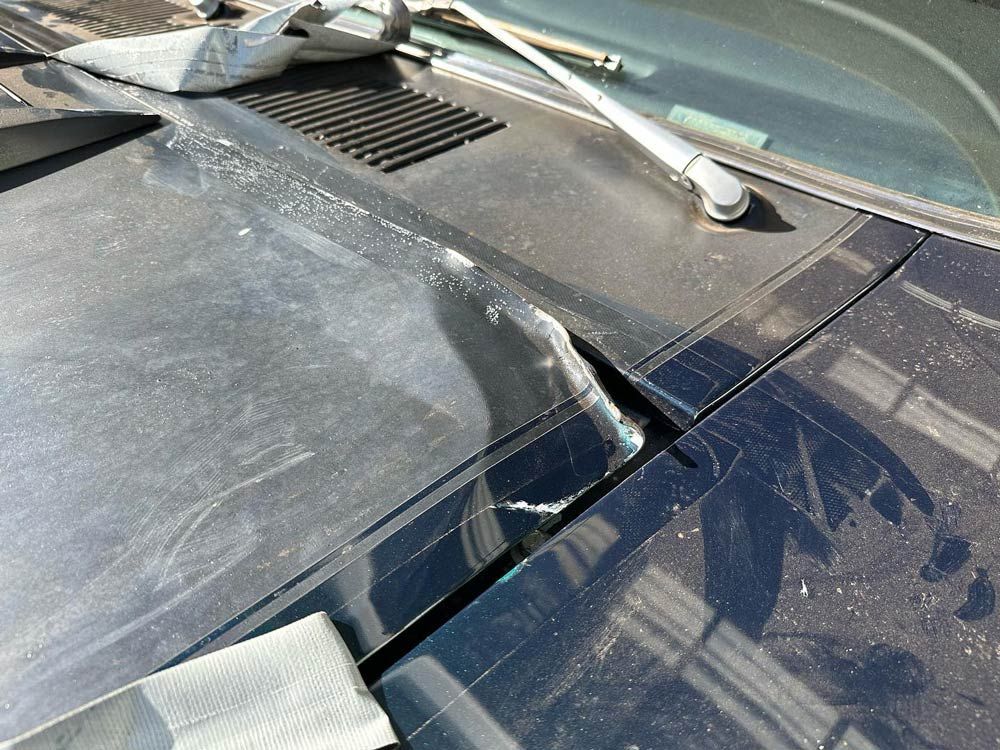 Damaged Car Hood — John Zelukovic Smash Repairs in Orange, NSW