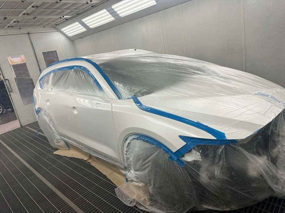 Car White Repaint — John Zelukovic Smash Repairs in Parkes, NSW