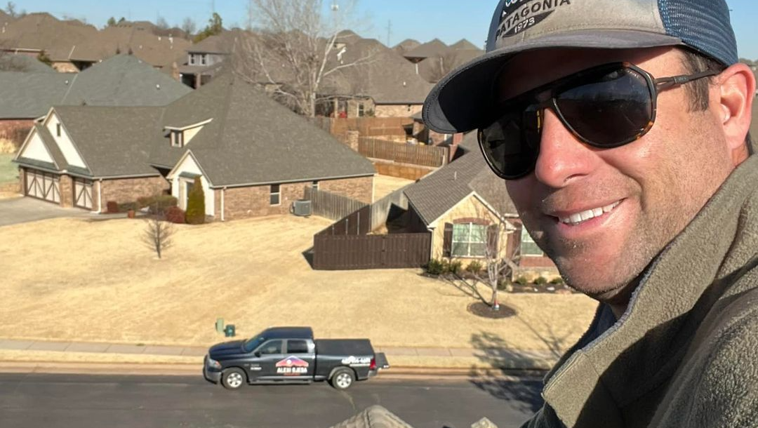 roofer repairing roof