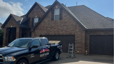 roofer replacing damaged roof