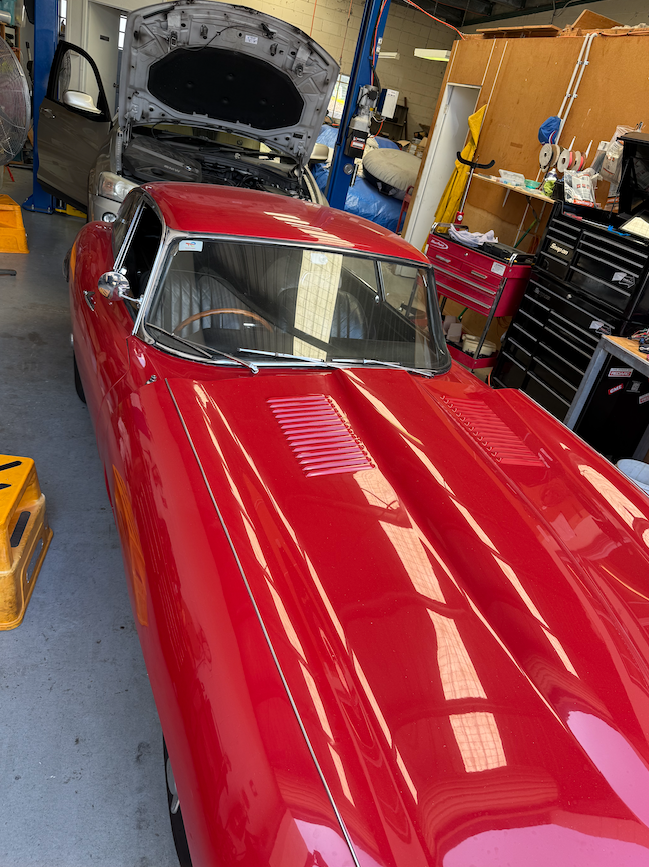 A Close Up Of A Flash Red Car In A Mechanic Workshop — Cabba Auto Electrics In Chinderah, NSW