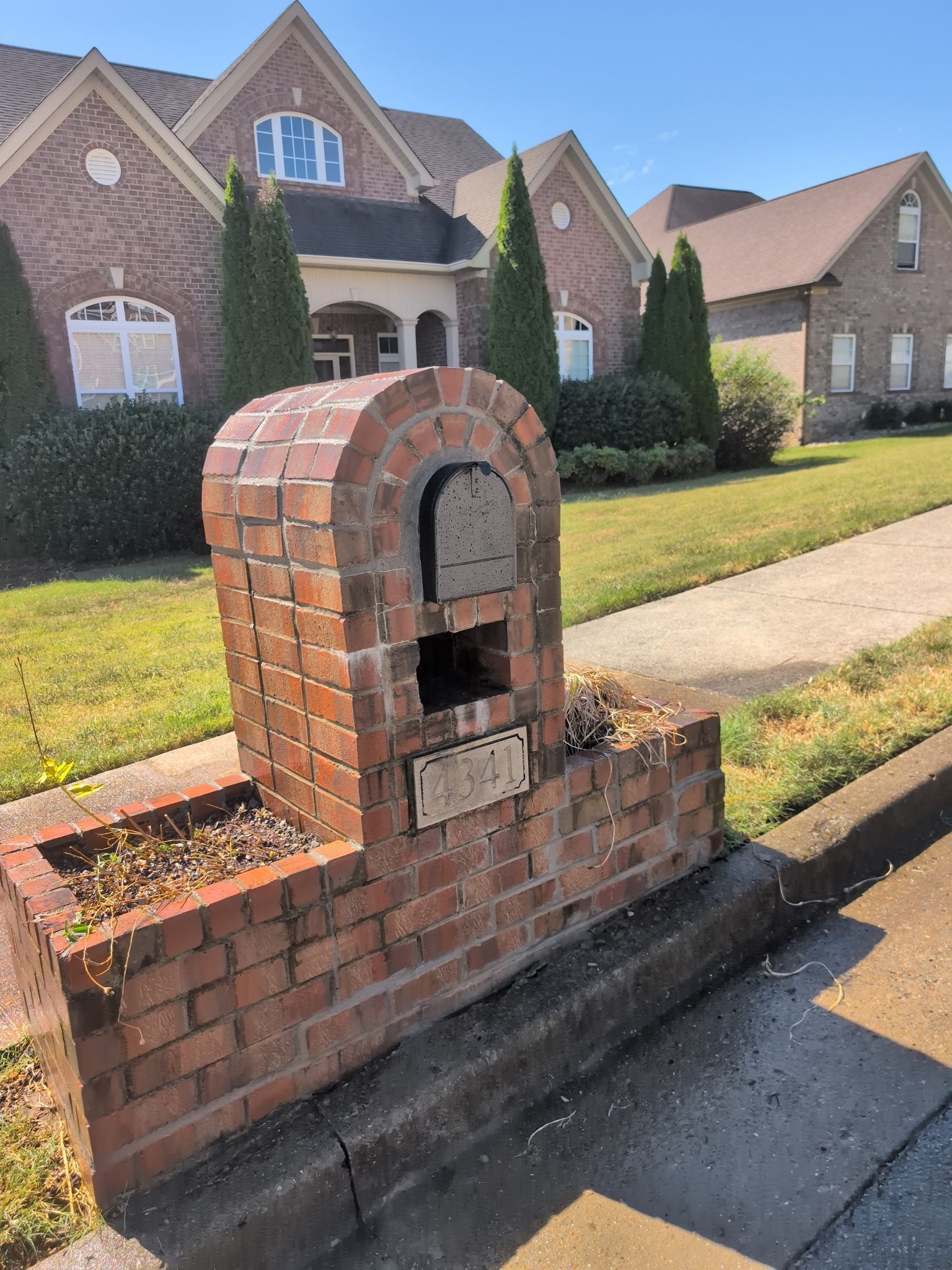 repaired brick mailbox