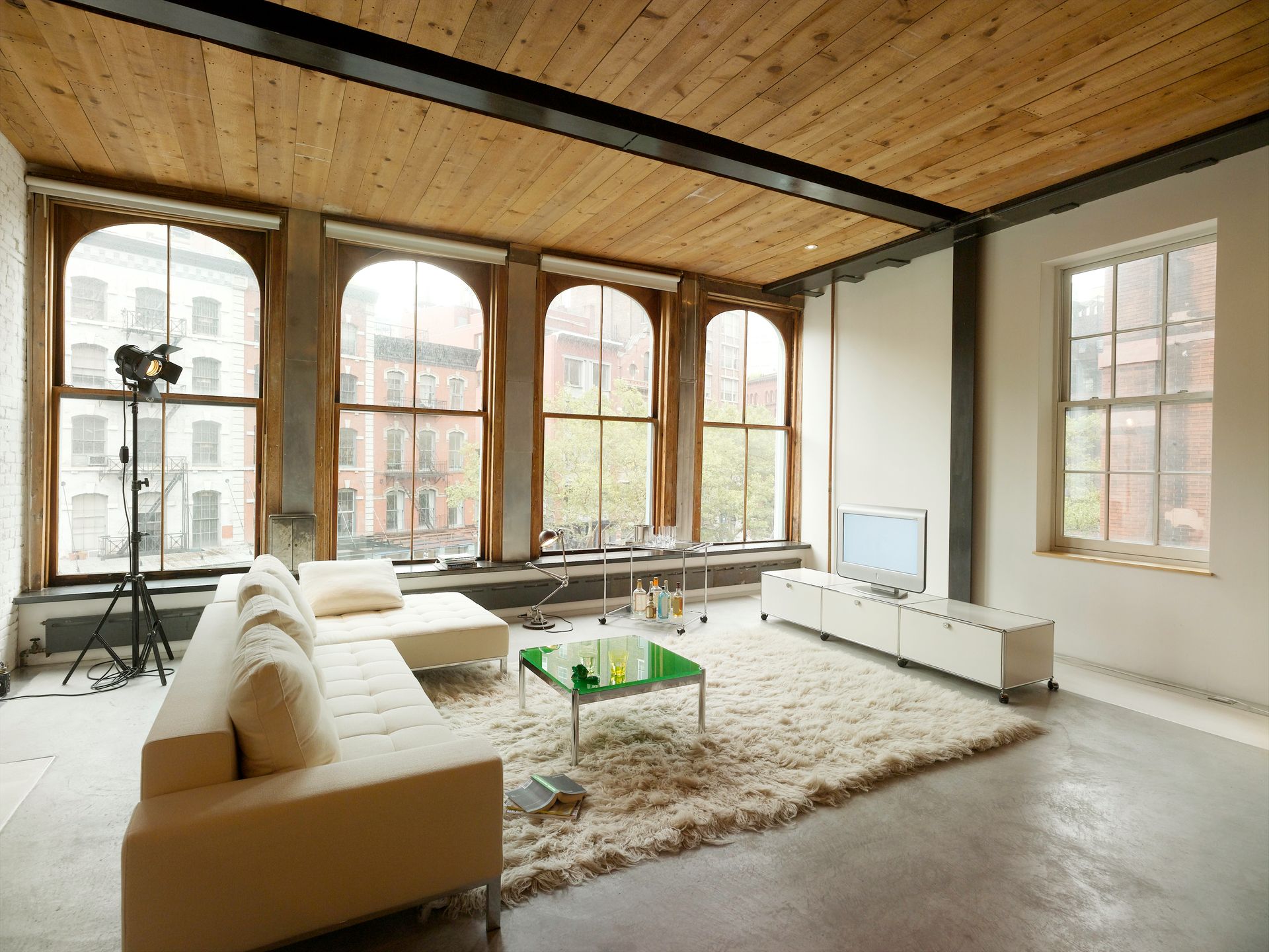 A living room with a couch and a coffee table