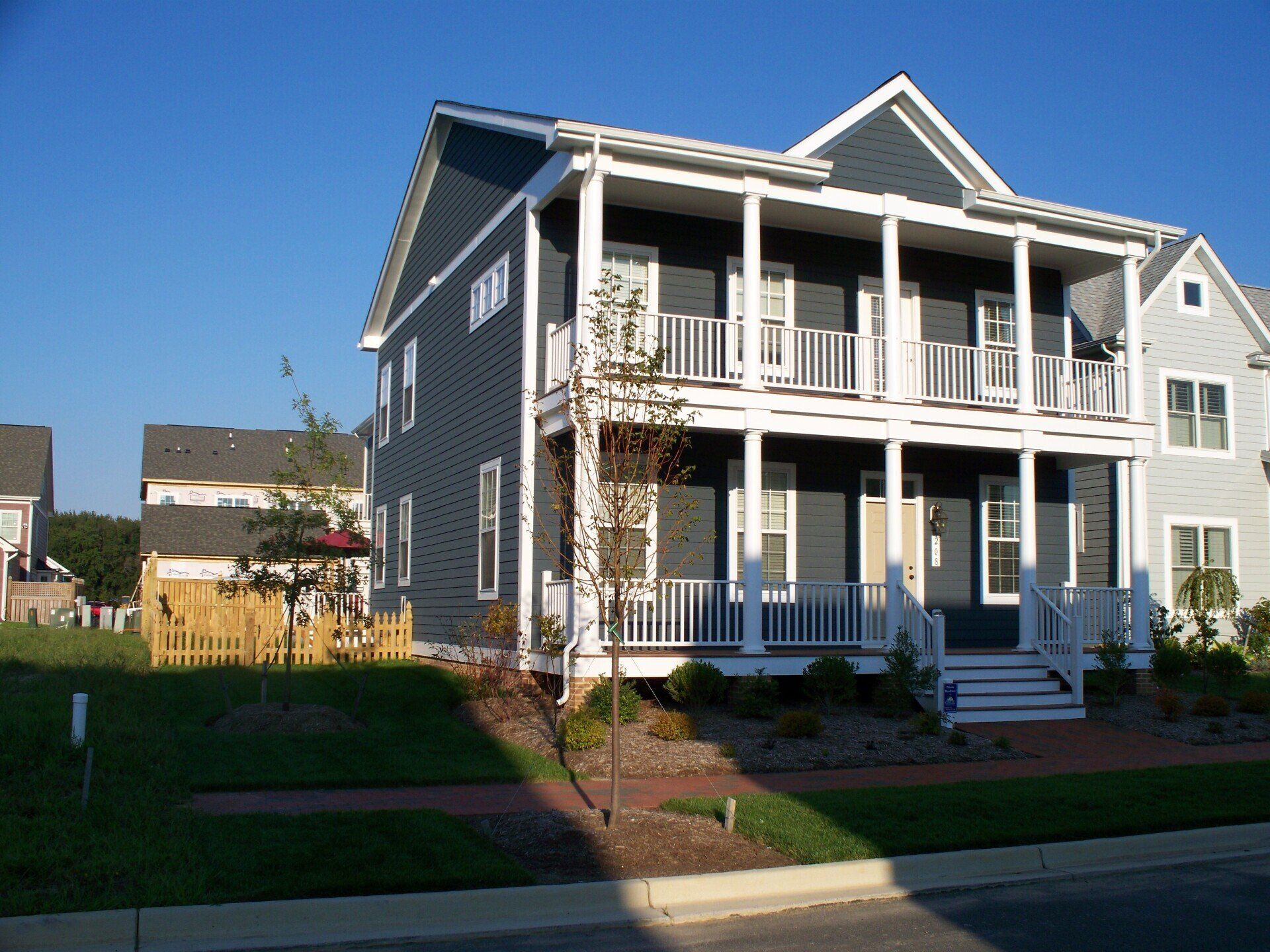 Grey two story home with porch exterior | Port Royal Classic | Covell Communities | Chester, Maryland 21619