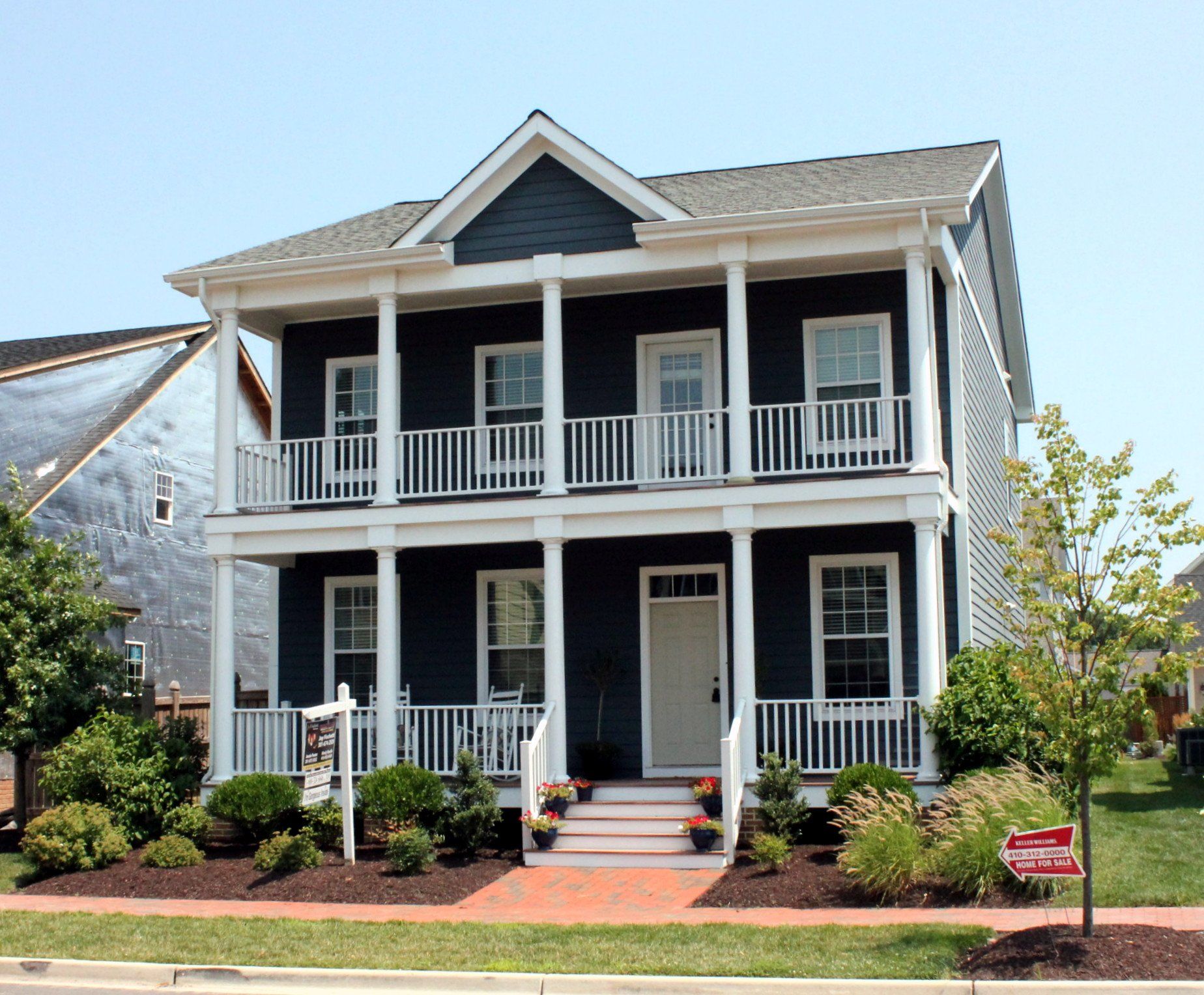 Blue home with porch exterior | Port Royal Executive | Covell Communities | Chester, Maryland 21619