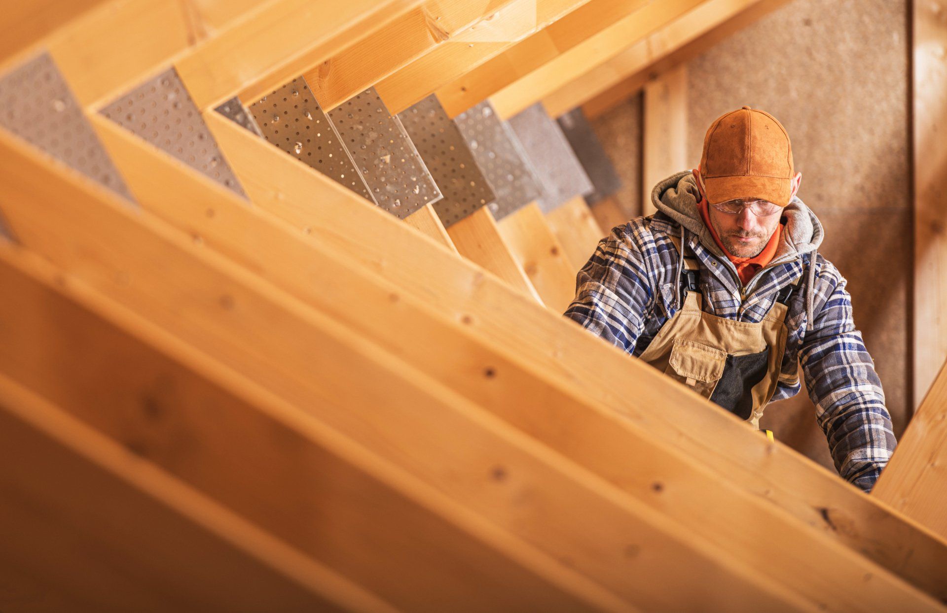 Man working on wooden struts | Build on Your Lot | Covell Communities | Chester, Maryland 21619