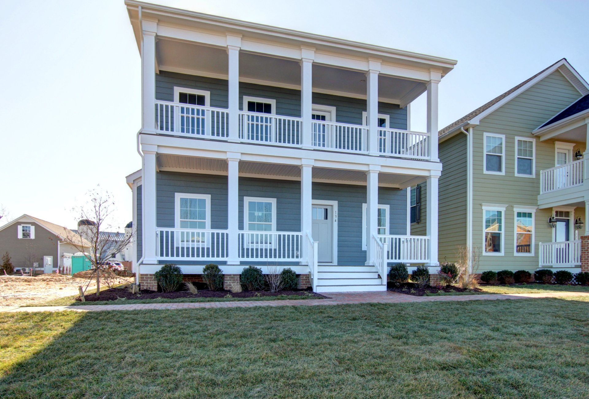 Grey home with porch exterior | Port Royal Legacy | Covell Communities | Chester, Maryland 21619