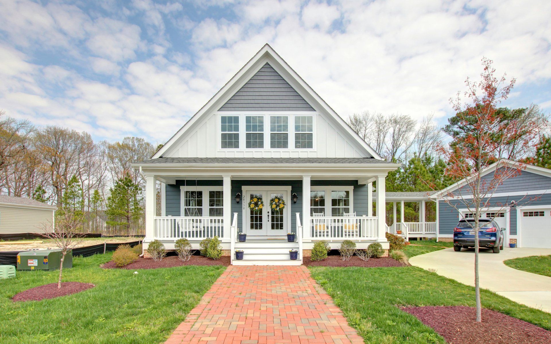 Two story home exterior with brick path | Covell Communities | Chester, Maryland 21619