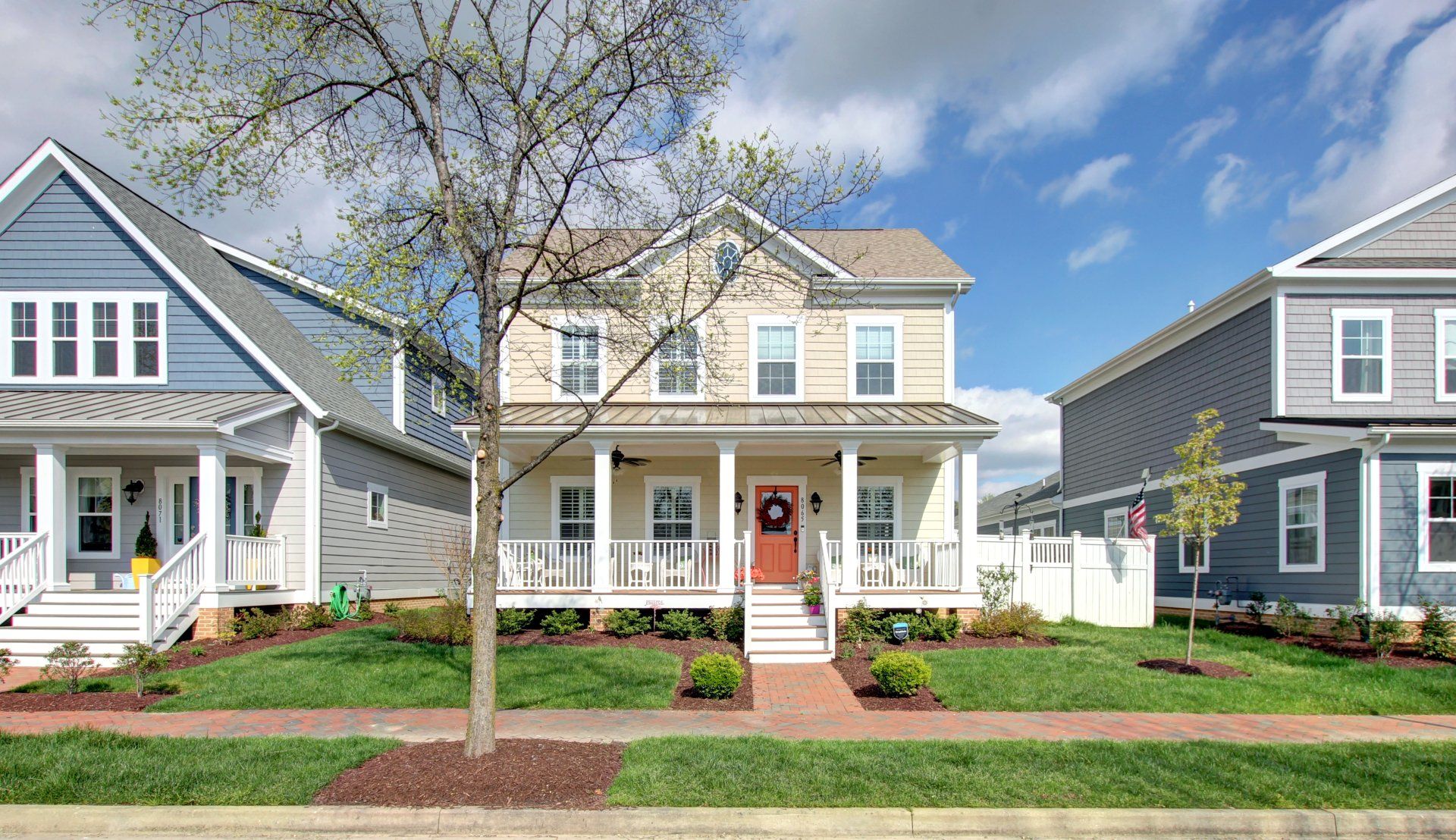 Two story yellow home exterior | Build on Your Lot | Covell Communities | Chester, Maryland 21619