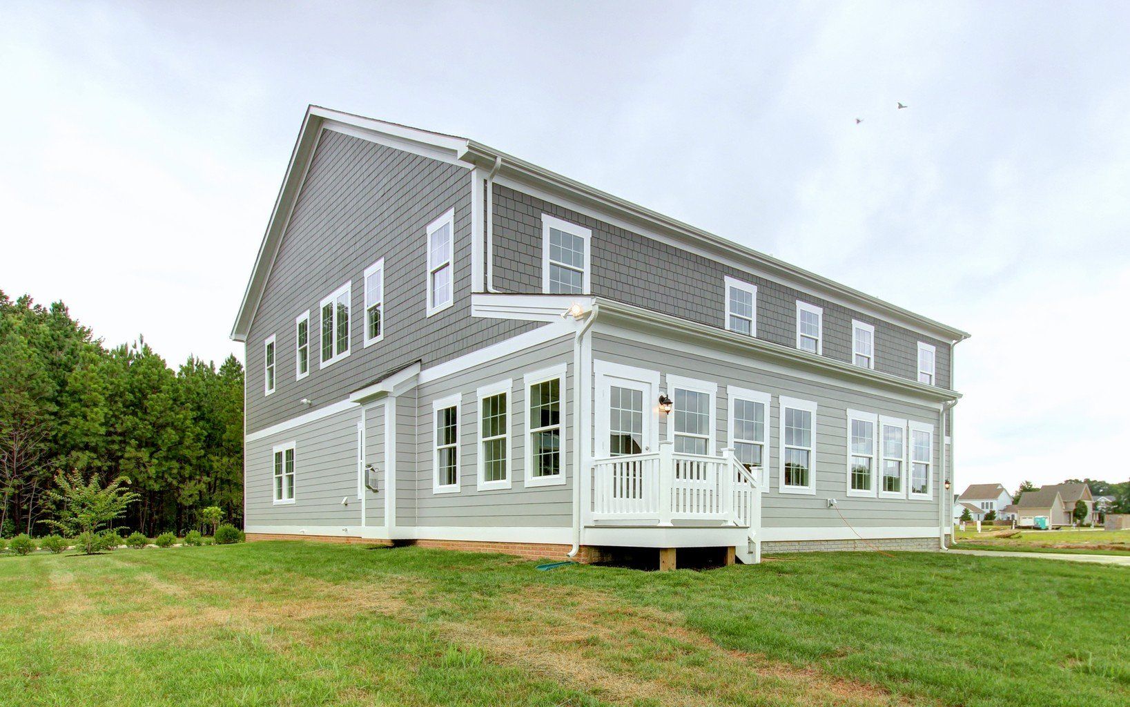 Grey two story home exterior | East Port Executive | Covell Communities | Chester, Maryland 21619