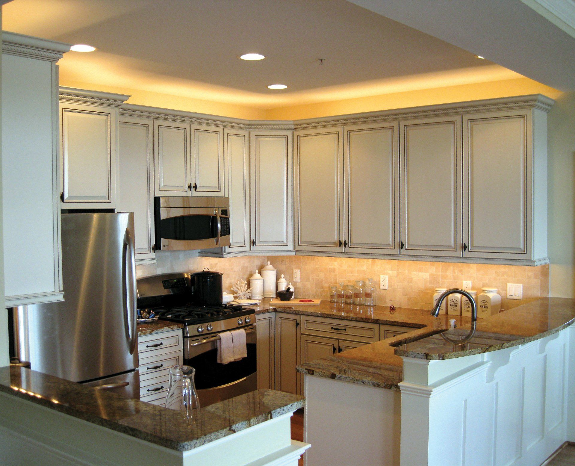Small modern kitchen with lighting above cabinets | Build on Your Lot | Covell Communities | Chester, Maryland 21619