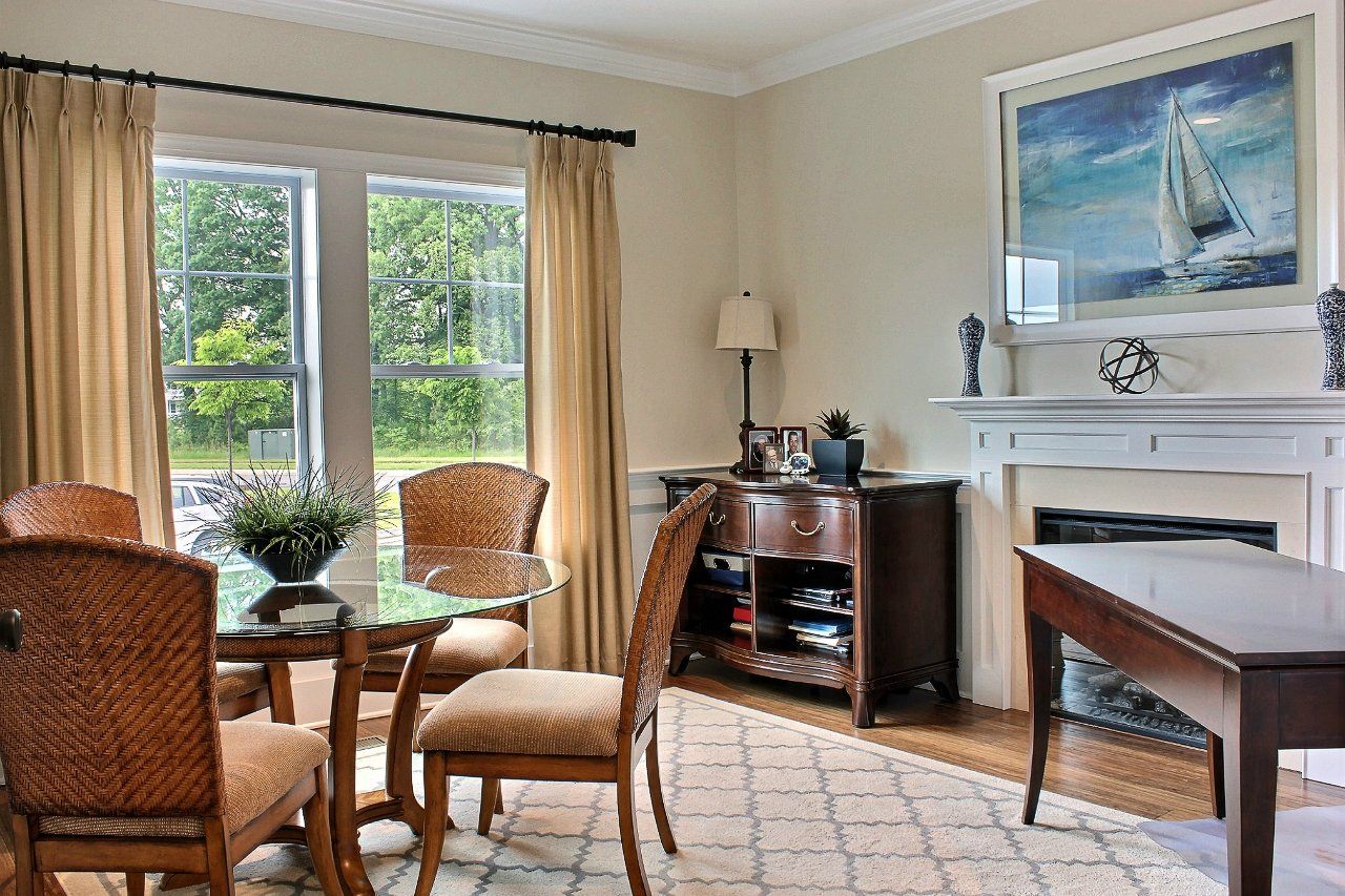 Dining and living room with fireplace | Monterey Legacy | Covell Communities | Chester, Maryland 21619