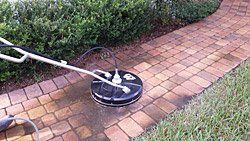 Cleaning Pavement With Cleaning Machine — Jacksonville FL — Paver Protections LLC