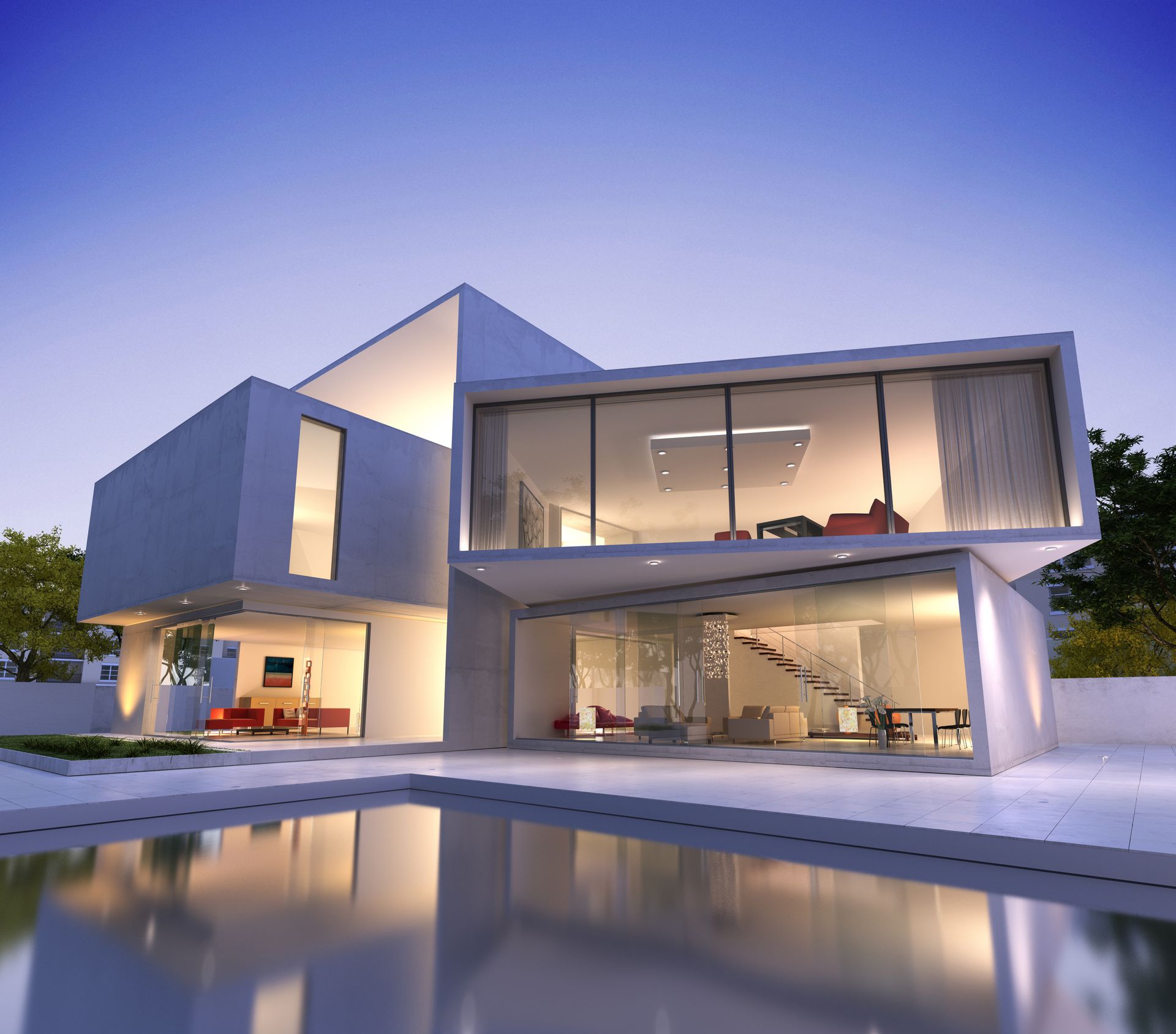 Modern glass-and-concrete house at dusk, lit interior reflecting in a calm pool