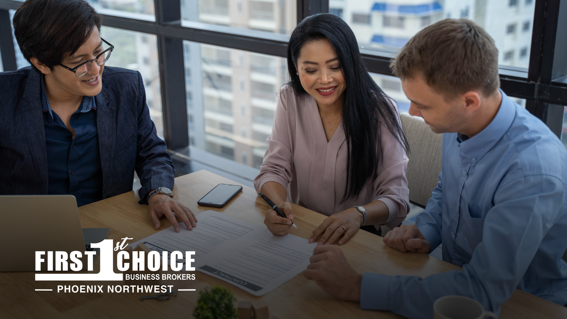 A seller, buyer and a business broker closing a sale