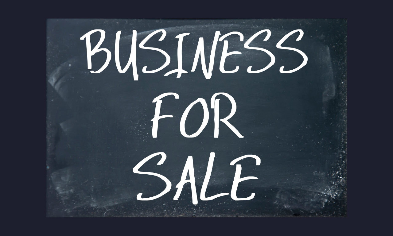 A blackboard with the words business for sale written on it