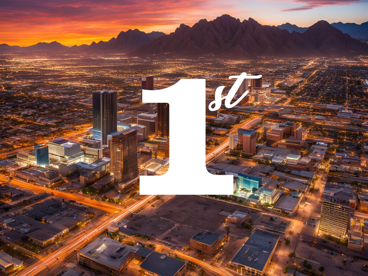 An aerial view of a city at night with the number 1 in the foreground