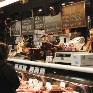 A butcher shop with a sign that says smoked turkey