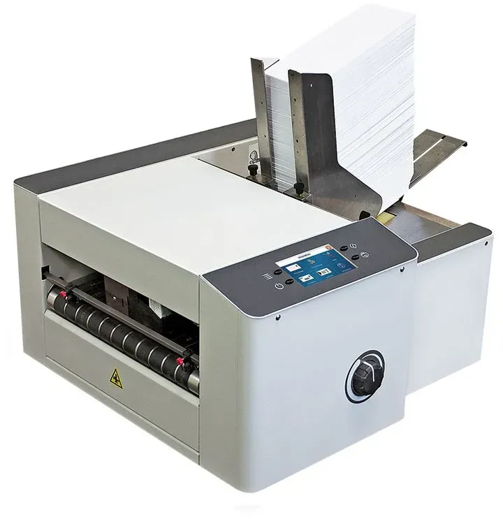 A white printer with a stack of paper coming out of it