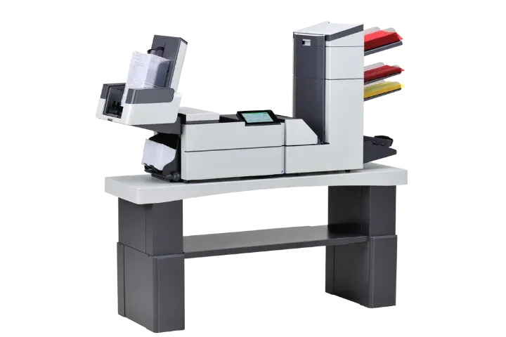 A printer is sitting on top of a table.