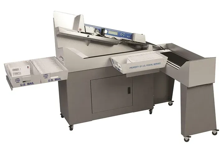 A machine that is sitting on a table with a white background.