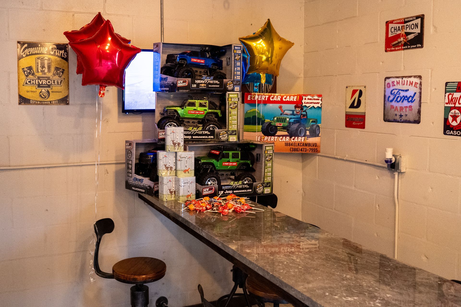 Small shop counter with lottery tickets, balloons, and product displays on the wall