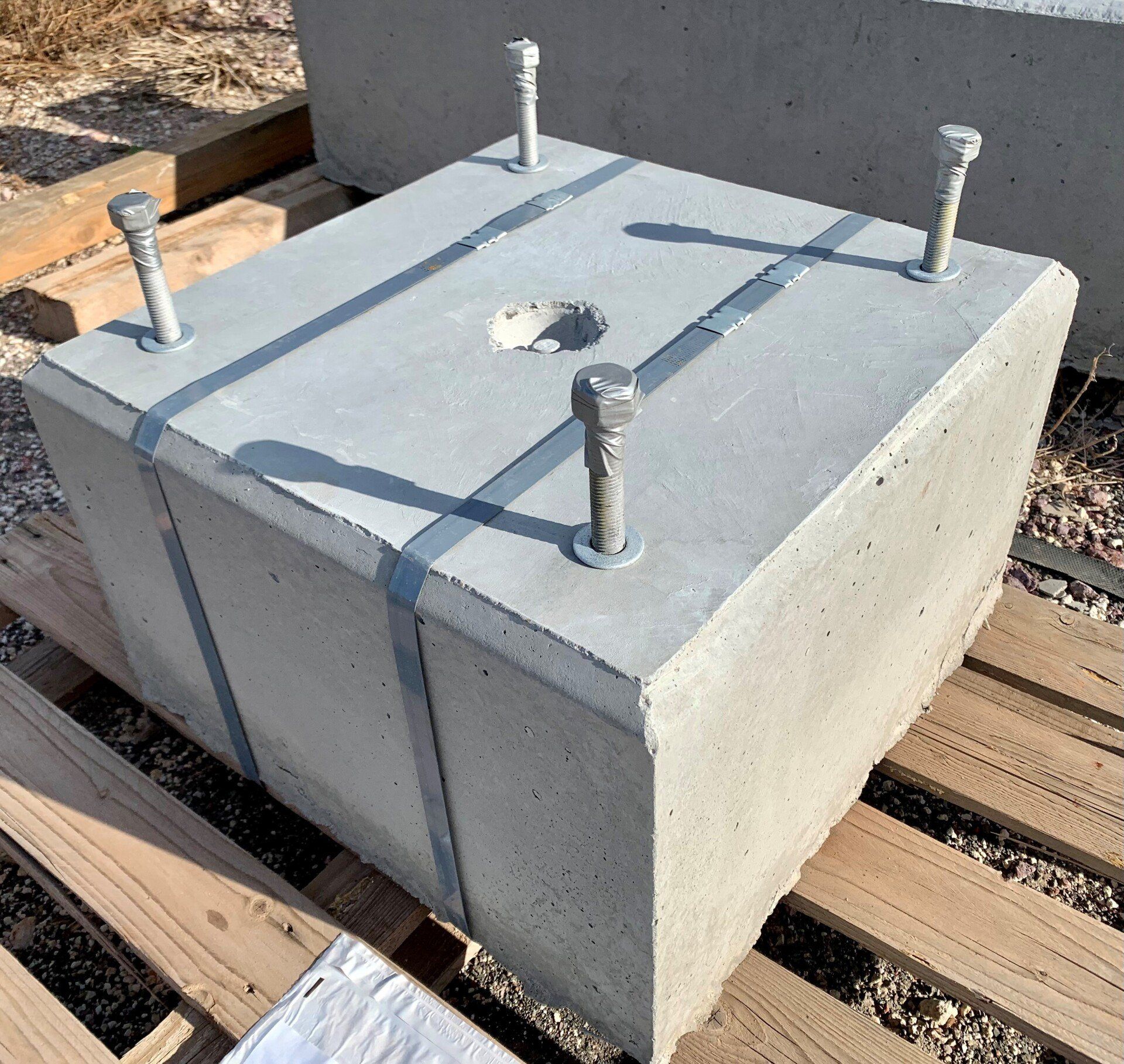 Custom block with threaded bolt down pins