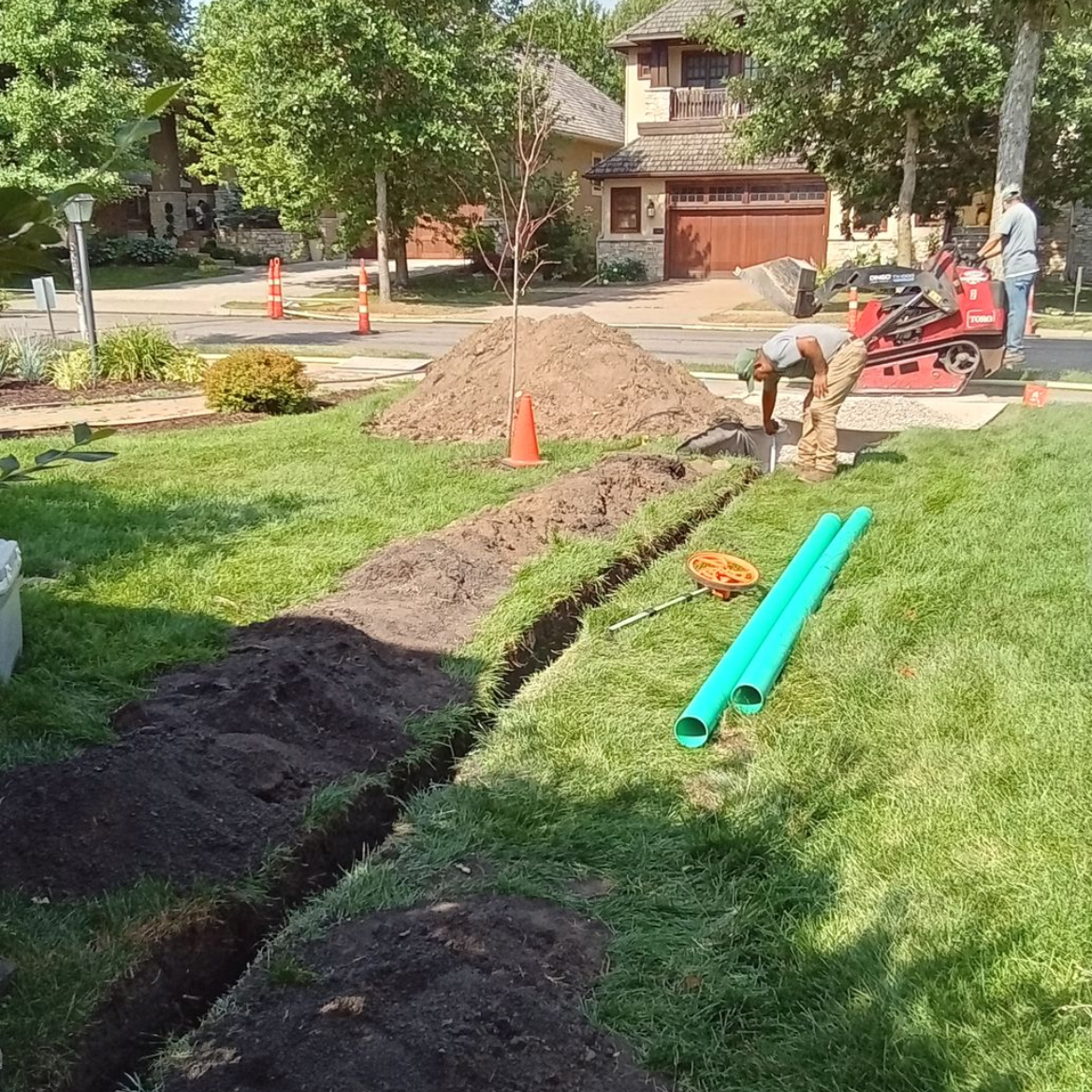 Our crew installing a dry well to handle water from an active sum pump discharge in Minneapolis MN