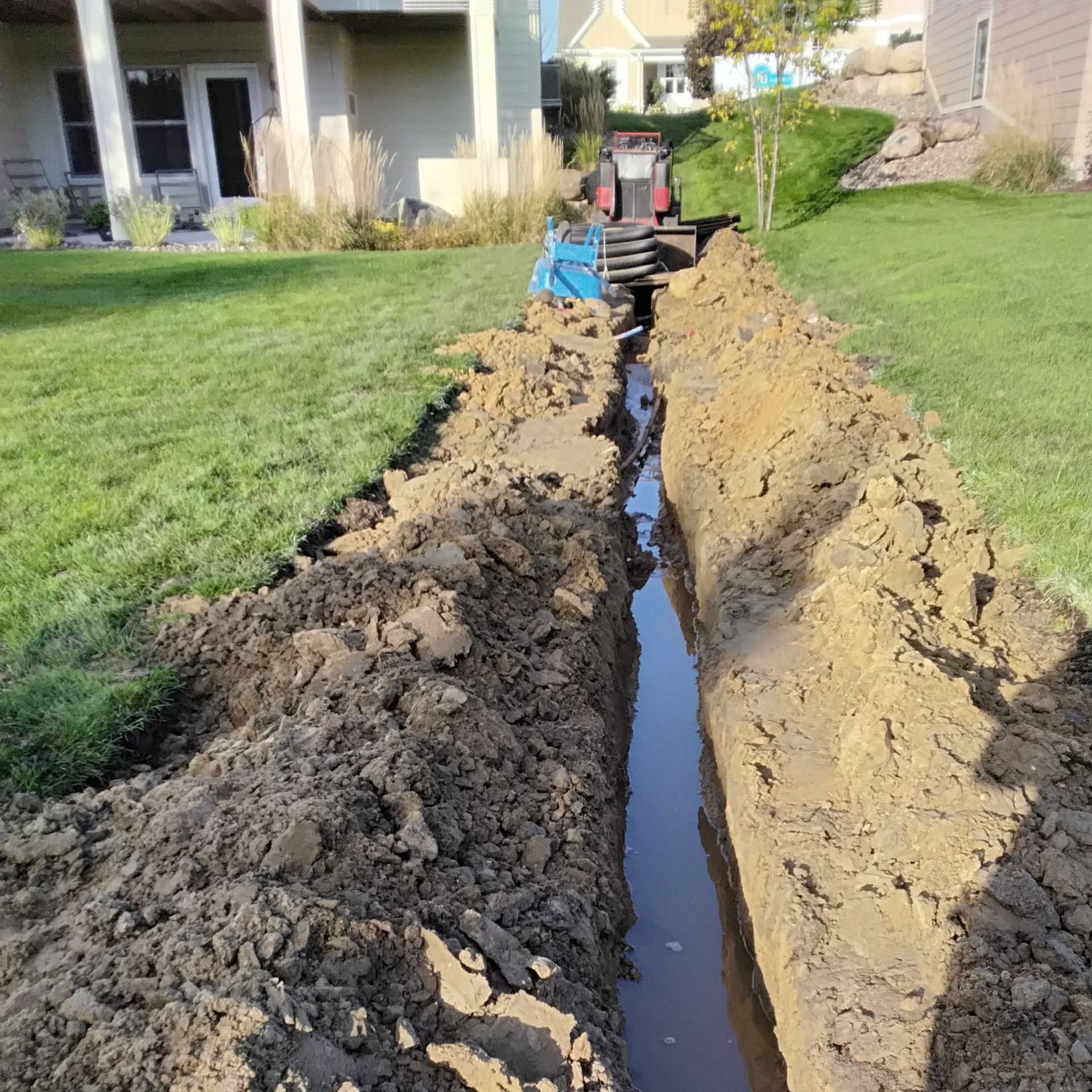 regrading+a+yard+with+toro+dingo+soil+conditioner+leveling+a+lawn+renovation+minnetonka+MN+KG+Landscape