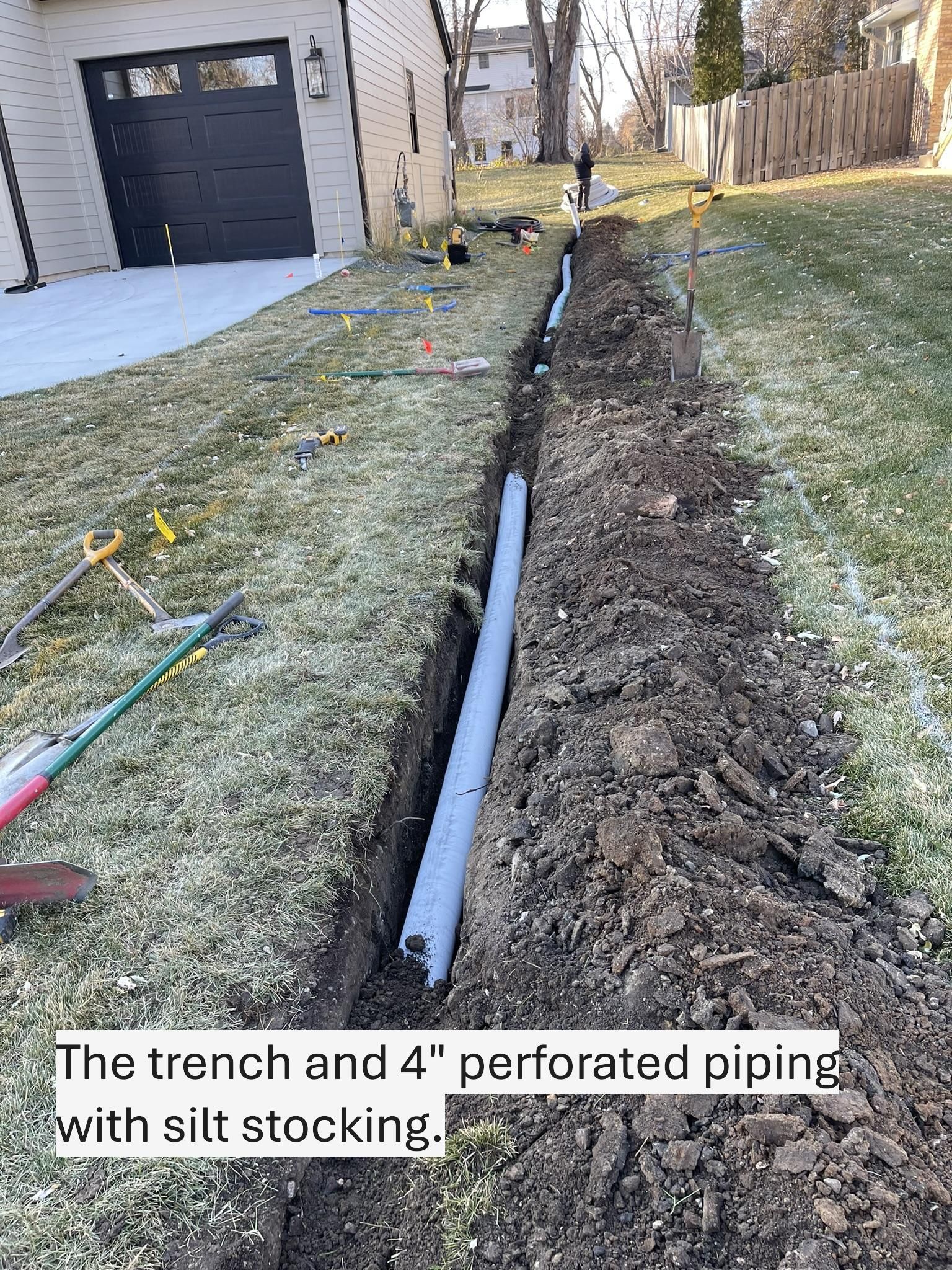 Drain tile in lawn during installation 