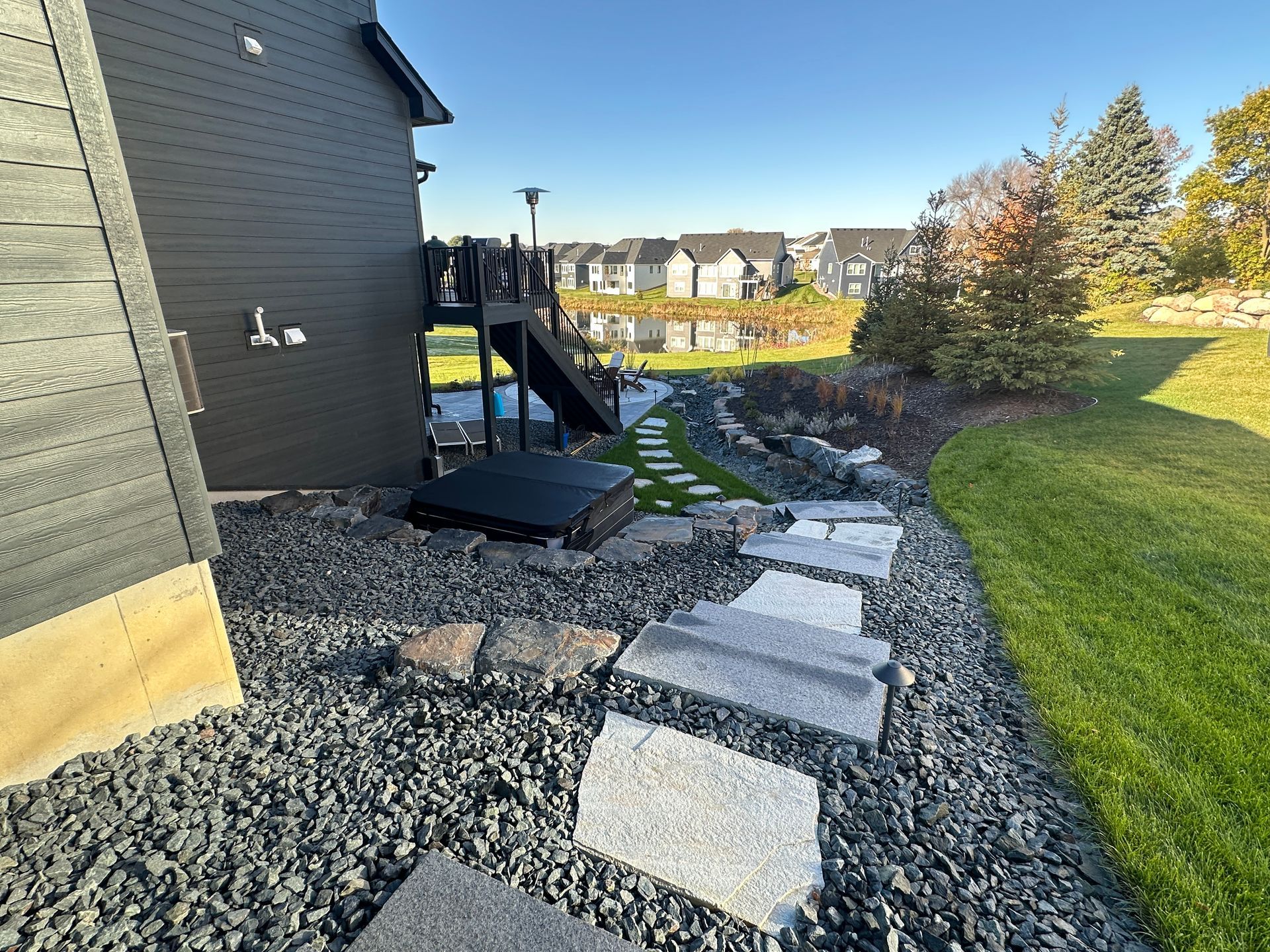 After image of the new steps and  rock beds built into a hill.