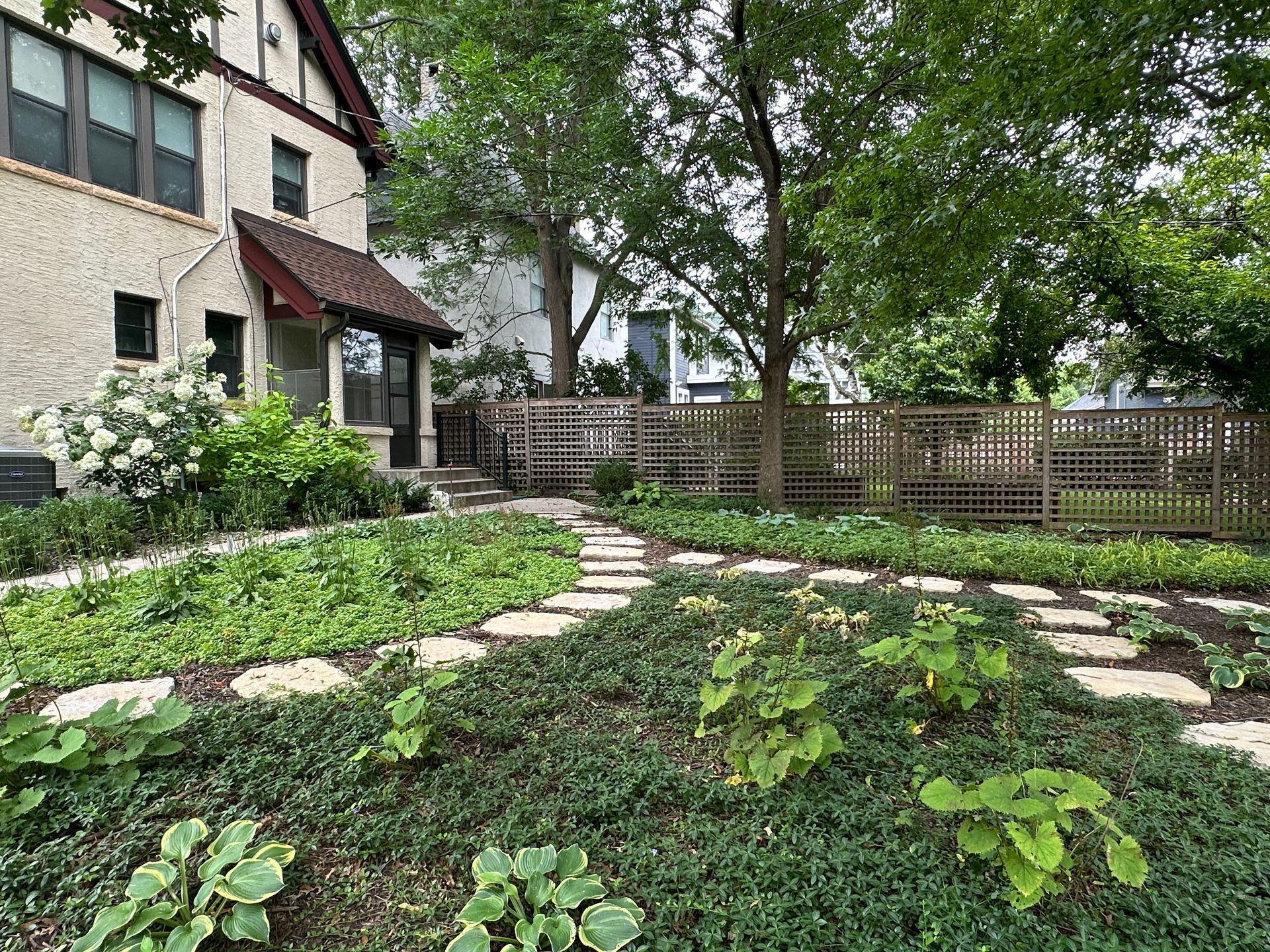 Backyard low maintenance ground cover landscaping in Minneapolis by KG Landscape