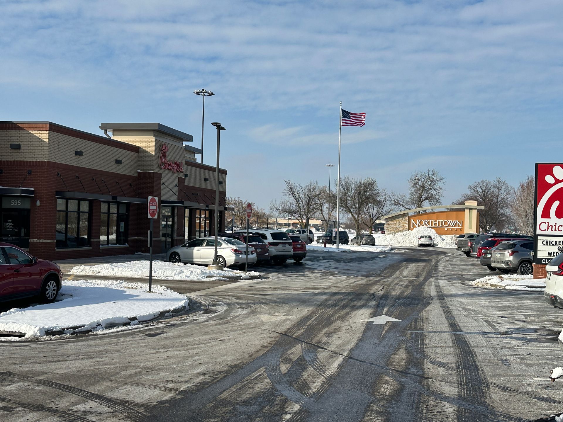 Drive-through snow removal at a commercial business in Minnesota