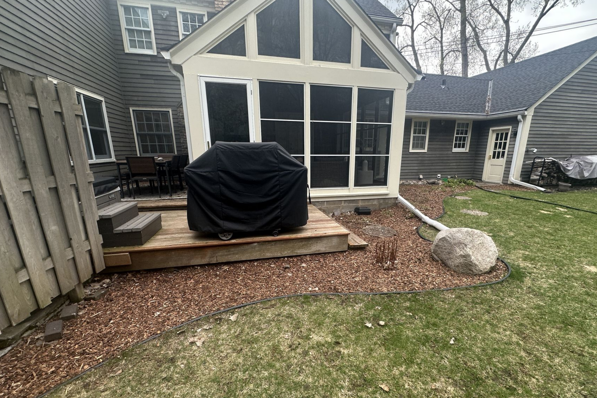 before picture of backyard with weird layout needing a redesign