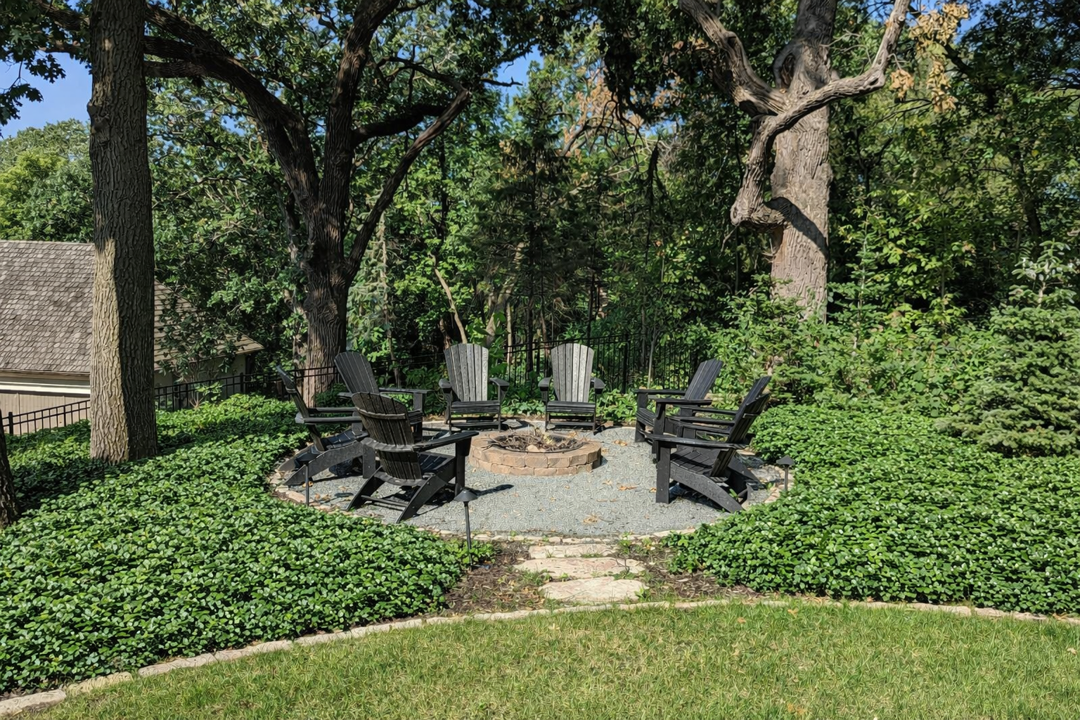 fire pit area on level space created on a hill