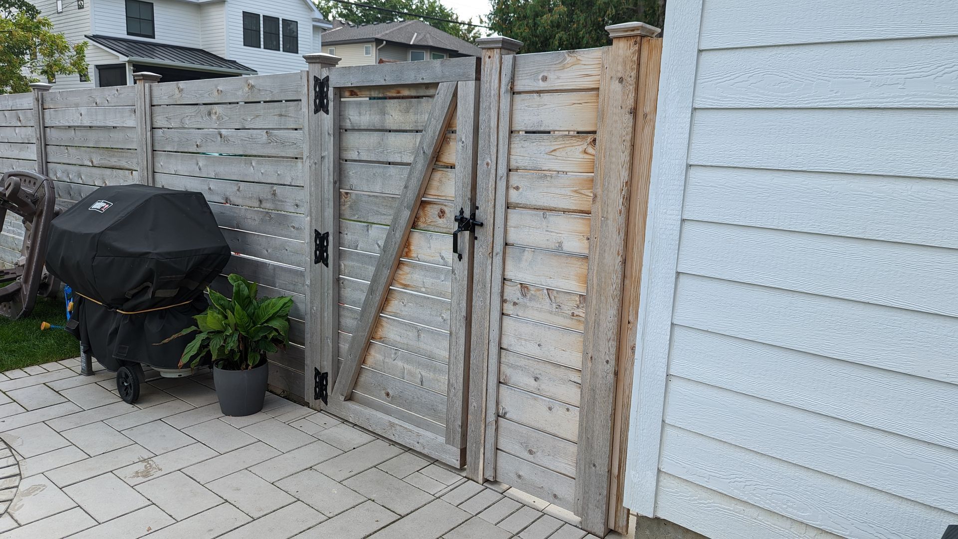 Horizontal cedar fencing for a new patio in MN.